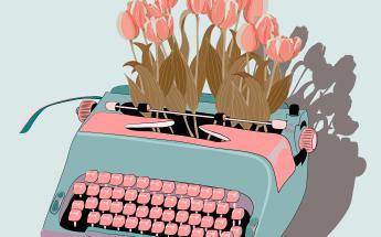 Blue typewriter with bouquet of tulips