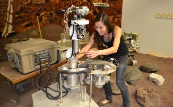 Student working on Mars rover prototype