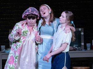 Three Actresses Acting On Stage