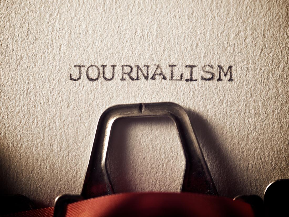 Journalism word written with typewriter machine.